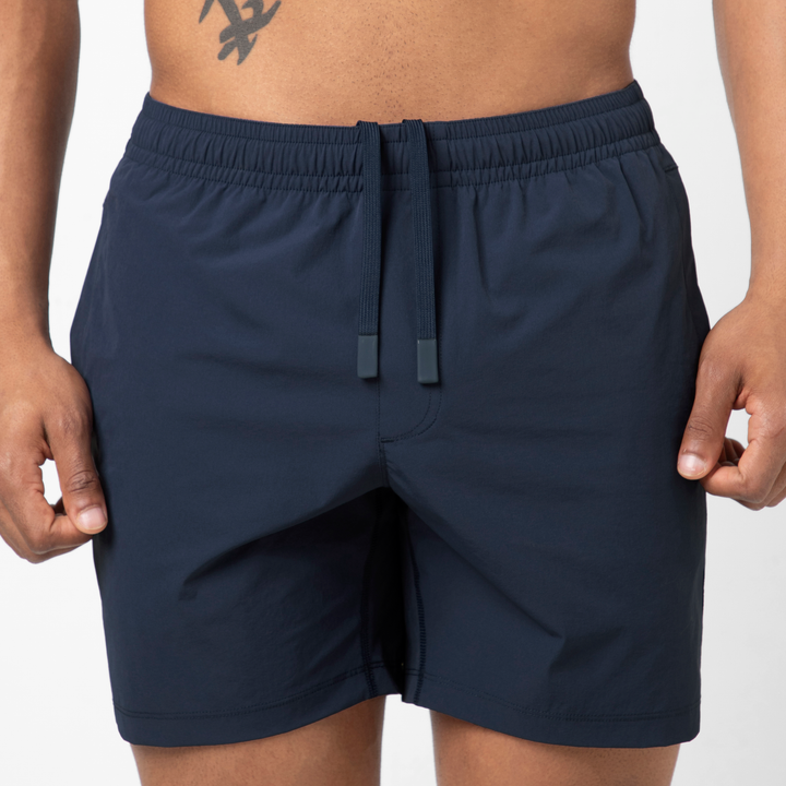 Atlas Short 5 Navy close up front on model