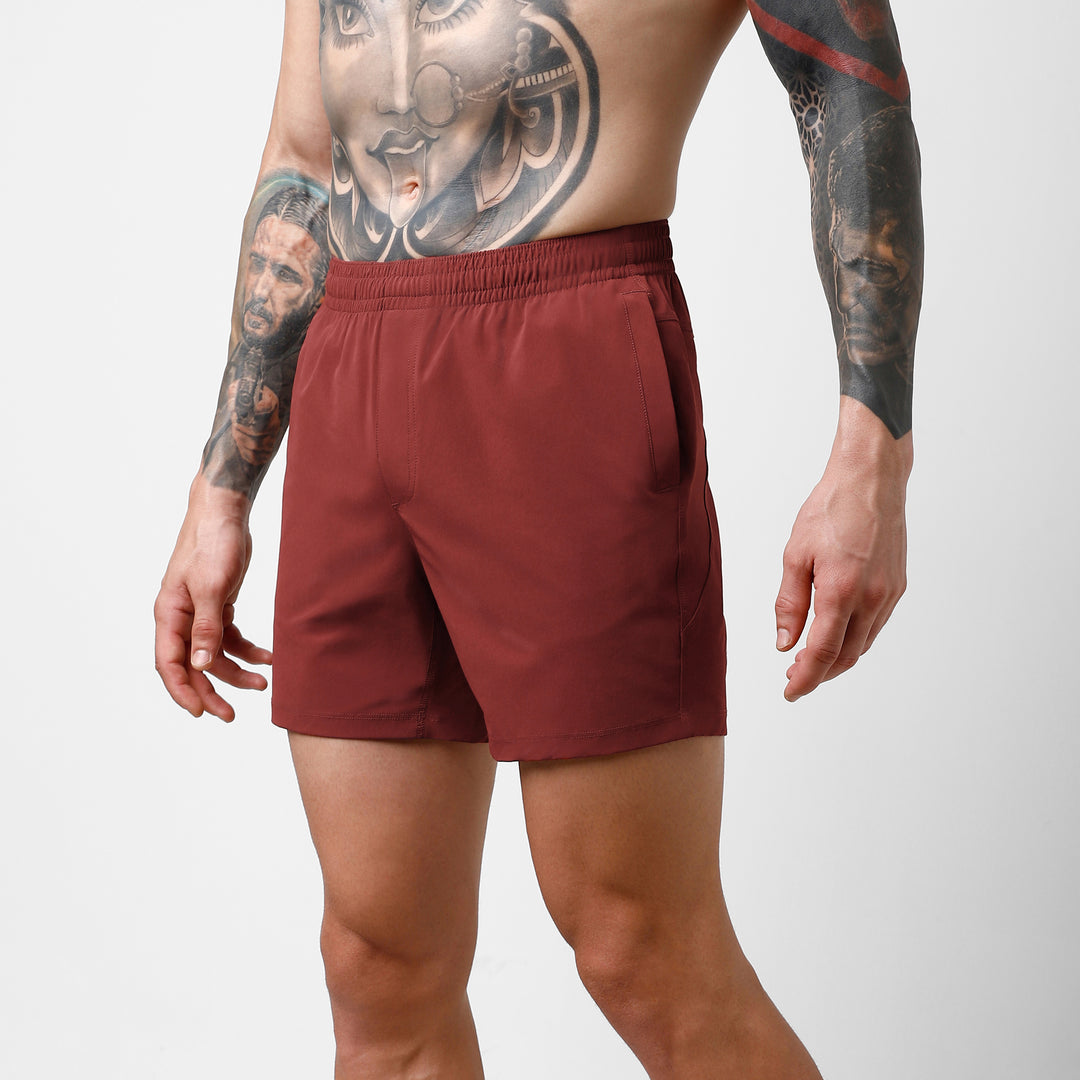 Atlas Short 5.5" Maroon side on model