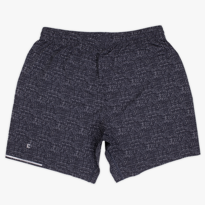 Run Short v2 7" Trace Blue back with elastic waistband, back right hidden zipper pocket, reflective line on bottom left hem, and reflective Bear B logo on bottom left leg