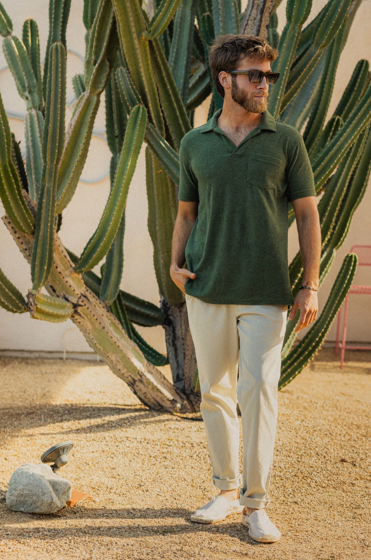 Model wearing Coastal Terry Polo in Olive Green with Relaxed Stretch Chino Pants in Stone