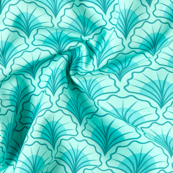Boys Stretch Swim Shell close up of mint blue shell print