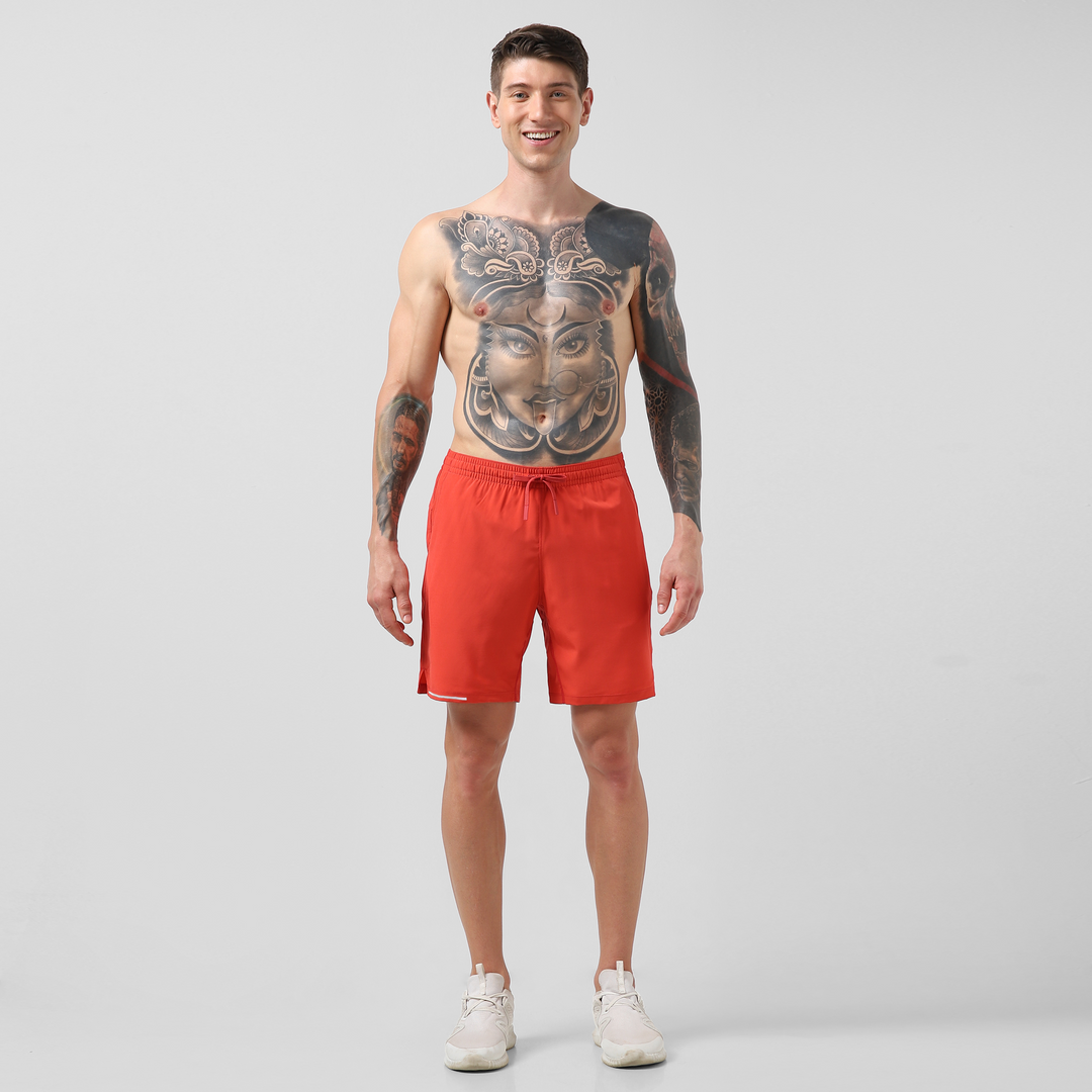 Run Short v2 7" Coral full body on model
