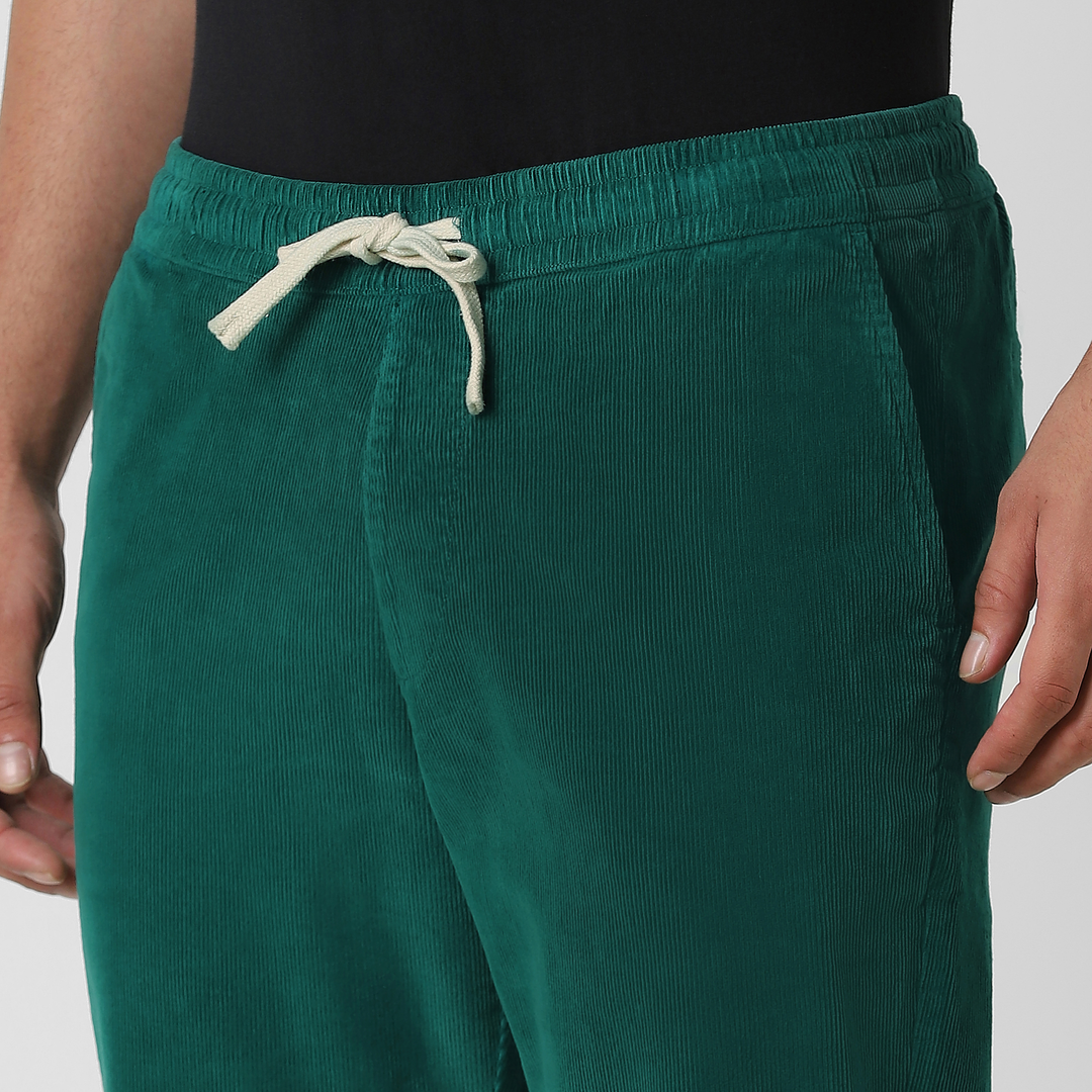Corduroy Easy Pant Deep Sea close up front on model with drawstring