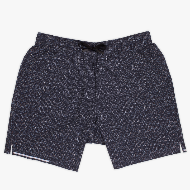 Run Short v2 7" Trace Blue  front with elastic waistband, dyed-to-match drawstring with rubberized tips, two front pockets, split hem, and reflective line on bottom right hem