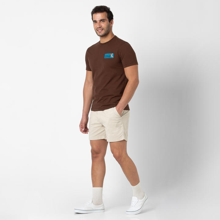 Natural Dye Graphic Tee Brown Pelican full body on model