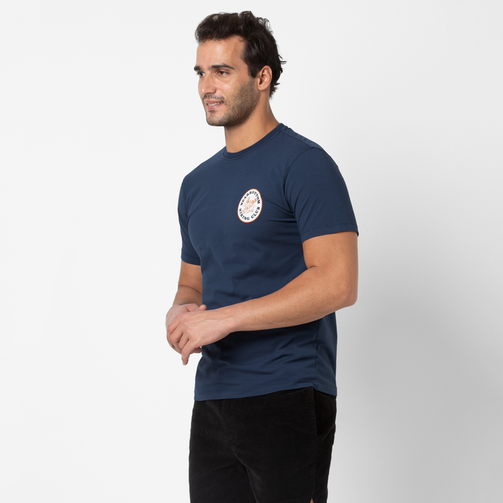 Natural Dye Graphic Tee Hiking side on model