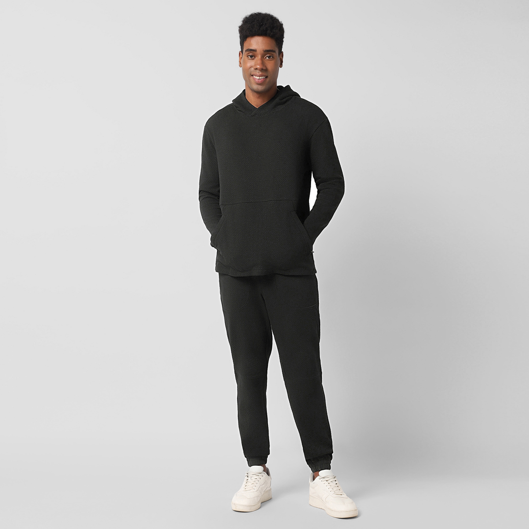 Roam Jogger Black full body on model worn with Roam Hoodie Black