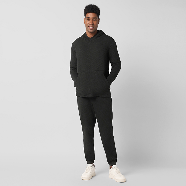 Roam Jogger Black full body on model worn with Roam Hoodie Black