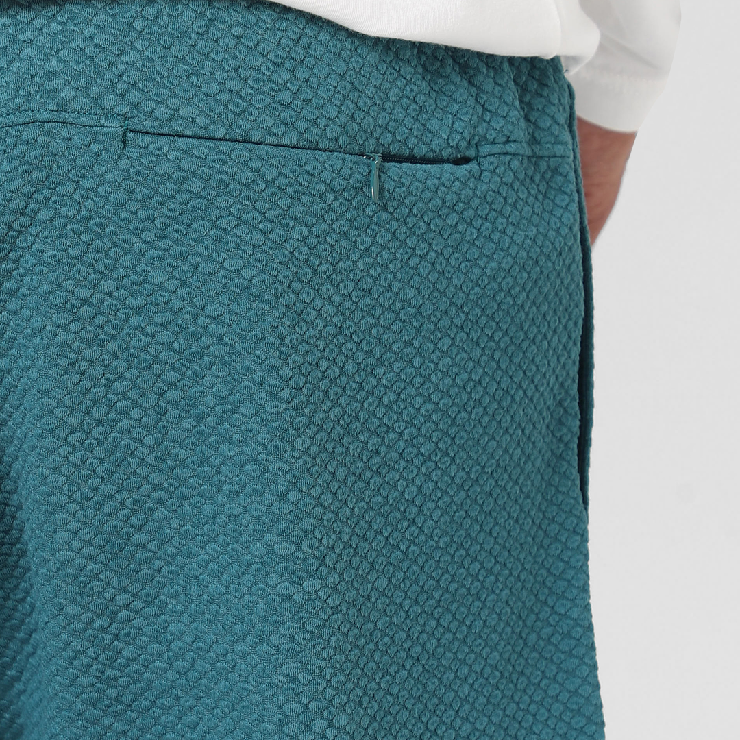 Roam Jogger Dark Teal close up of back zipper pocket