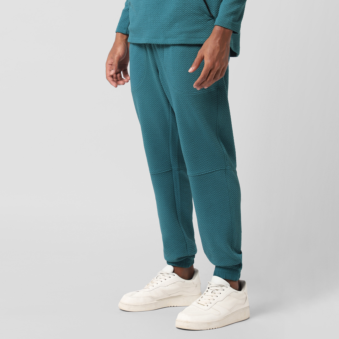 Roam Jogger Dark Teal left side on model