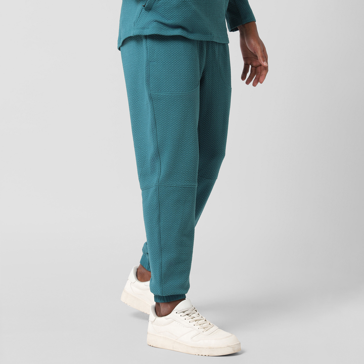 Roam Jogger Dark Teal right side on model
