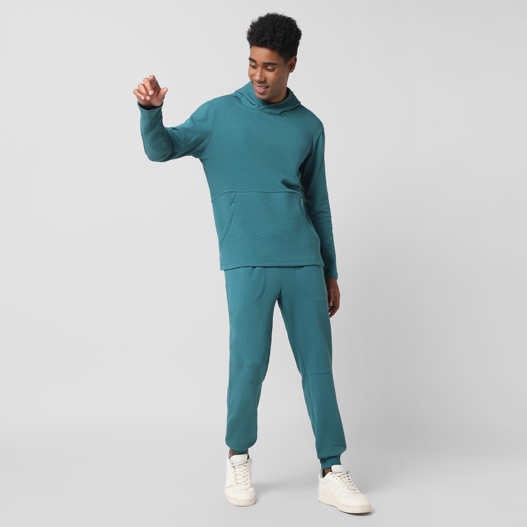 Roam Jogger Dark Teal full body on model worn with Roam Hoodie Dark Teal
