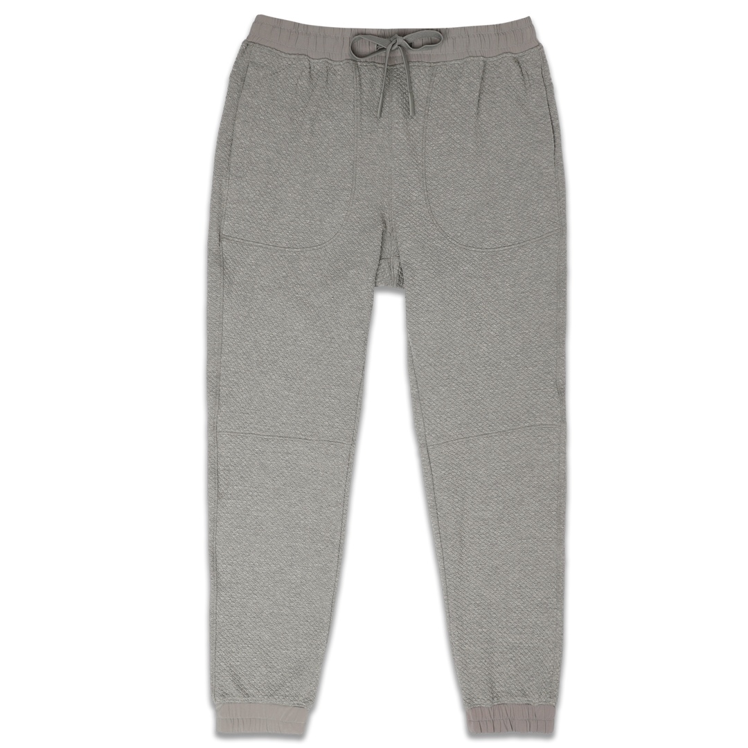Roam Jogger Heather Grey front with an elastic waistband, two side seam pockets, dyed to match drawstring, and ribbed ankle cuffs
