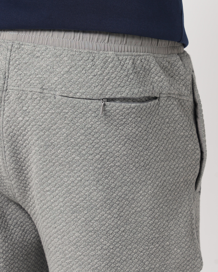 Roam Jogger Heather Grey close up of back zipper pocket