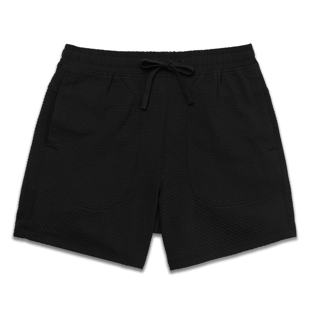 Roam Short 5.5" Black front with an elastic waistband, two side seam pockets, and dyed to match drawstring