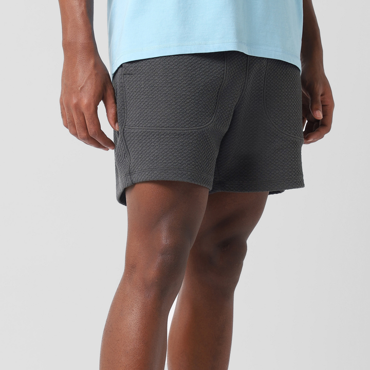 Roam Short 5.5" Coal right side on model