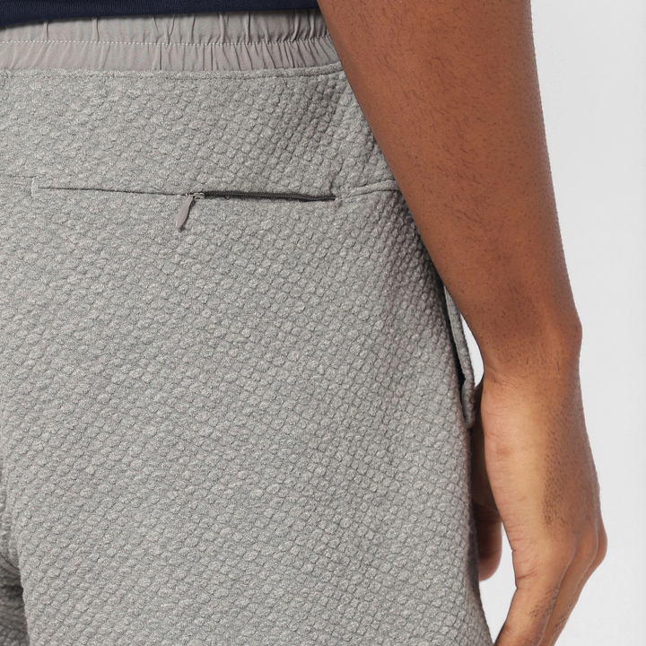 Roam Short 7" Heather Grey close up of back zipper pocket