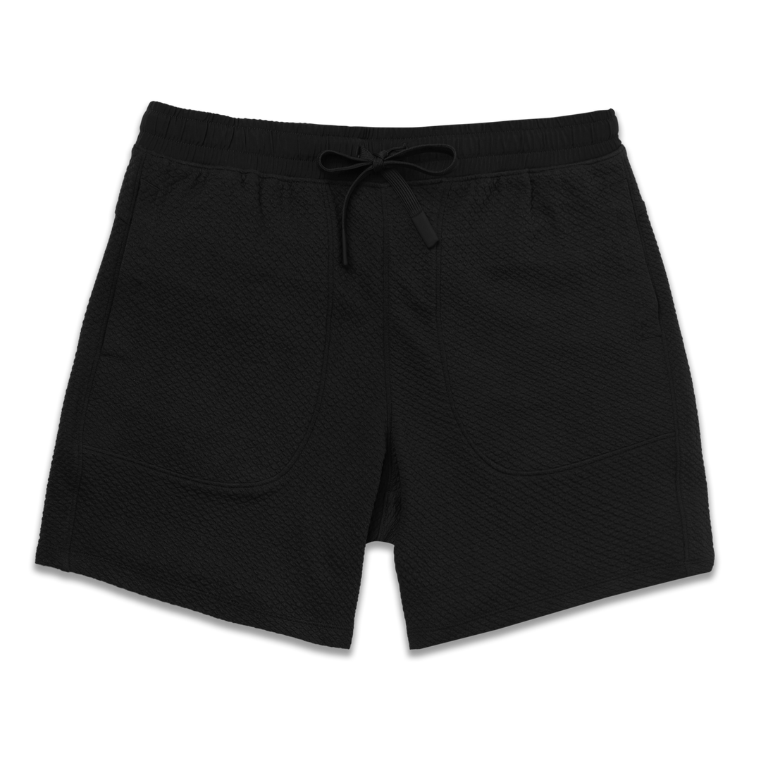 Roam Short 7" Black front with an elastic waistband, two side seam pockets, and dyed to match drawstring