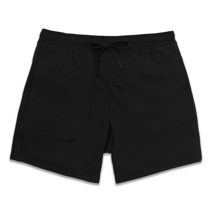 Roam Short 7" Black front with an elastic waistband, two side seam pockets, and dyed to match drawstring