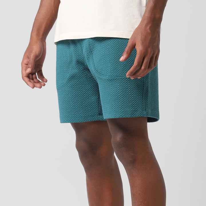 Roam Short 7" Dark Teal left side on model
