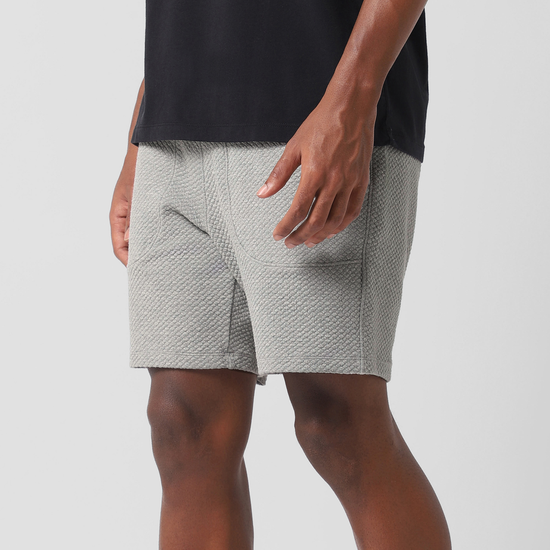 Roam Short 7" Heather Grey left side on model