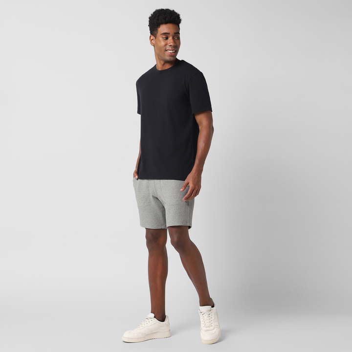 Roam Short 7" Heather Grey full body on model