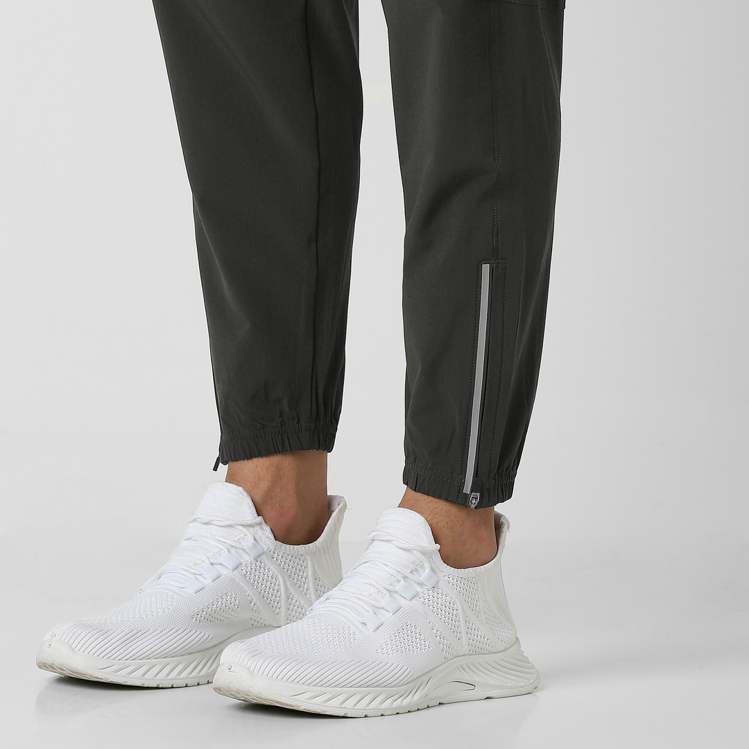 Run Jogger Coal close up zipper at ankles, and reflective strip at side seam/bottom hem