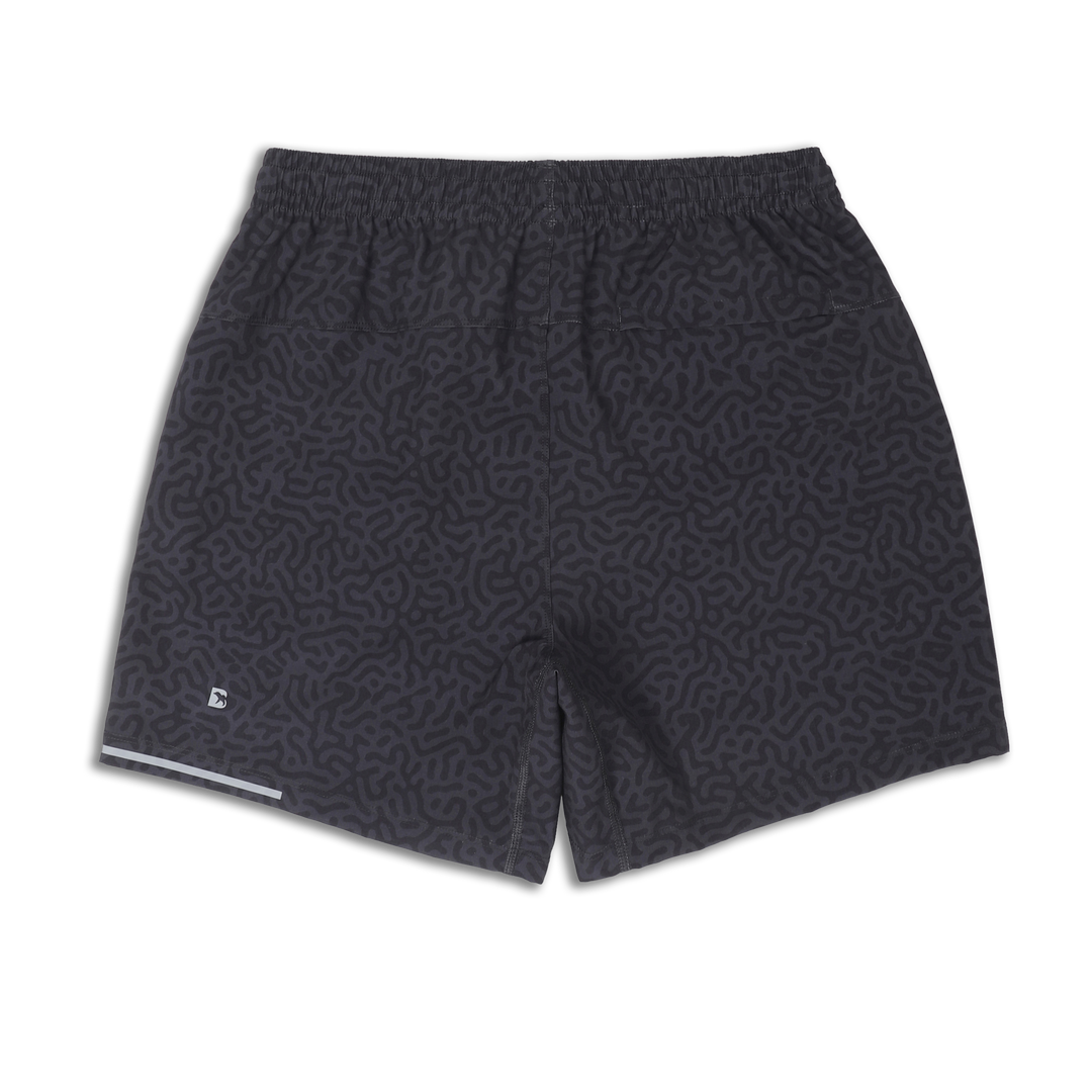 Run Short v2 7" Maze Navy back with elastic waistband, back right hidden zipper pocket, reflective line on bottom left hem, and reflective Bear B logo on bottom left leg