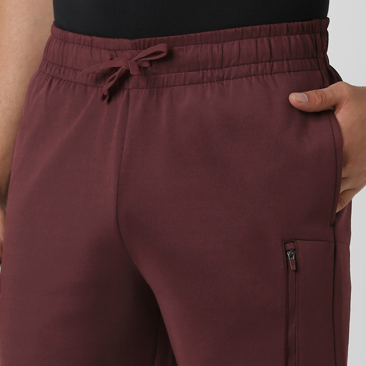 Scuba Short Maroon front close up left pocket on model