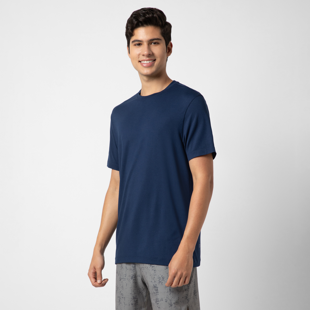 Short Sleeve Tech Tee Solid Navy side on model