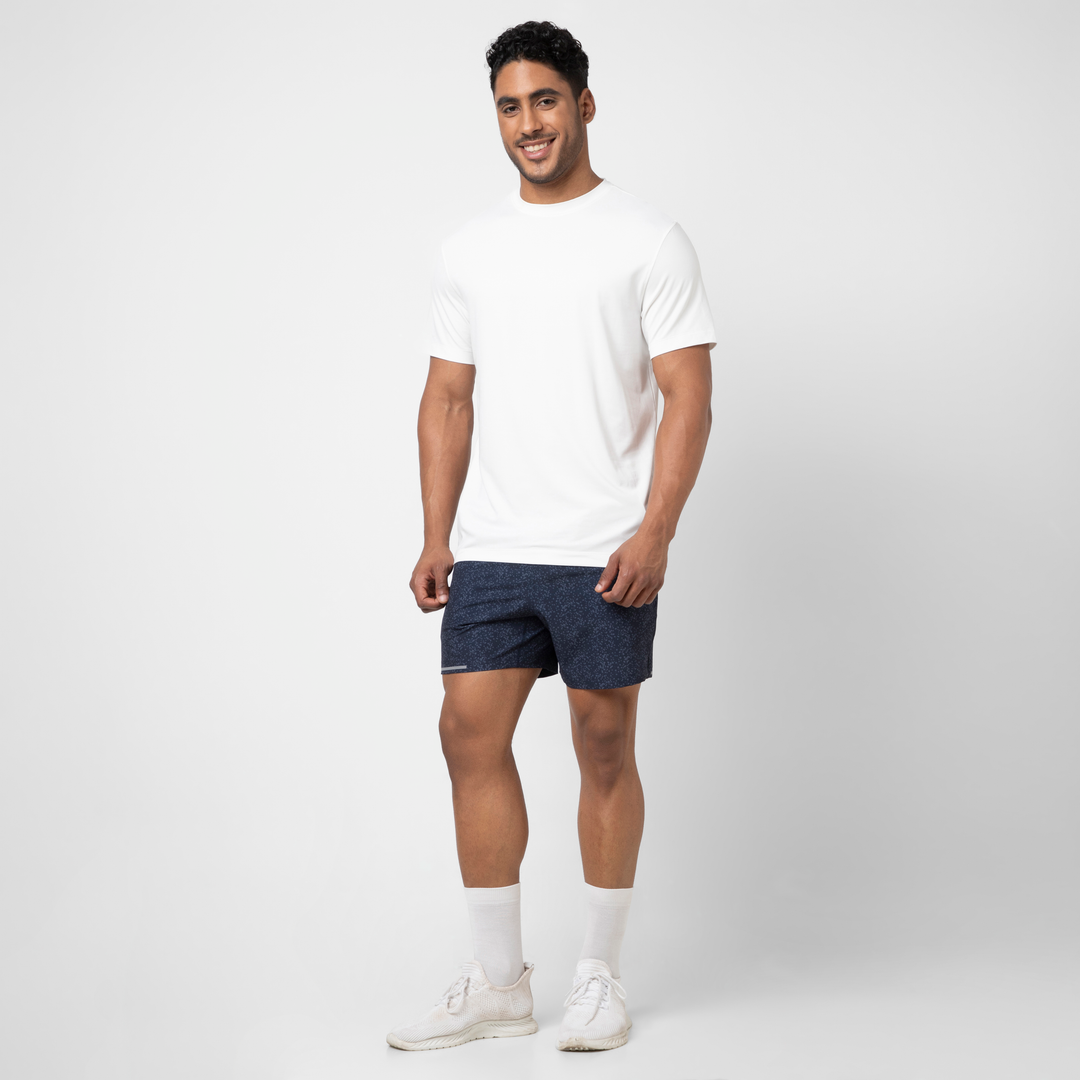 Short Sleeve Tech Tee Solid White full body on model