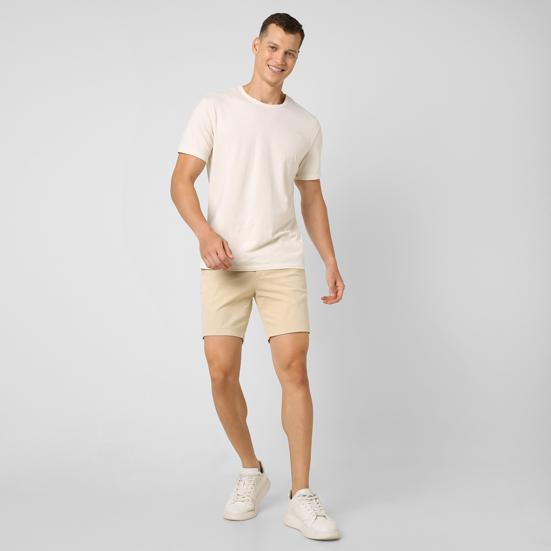 Stretch Chino Short 7" Sand Dune full body  on model