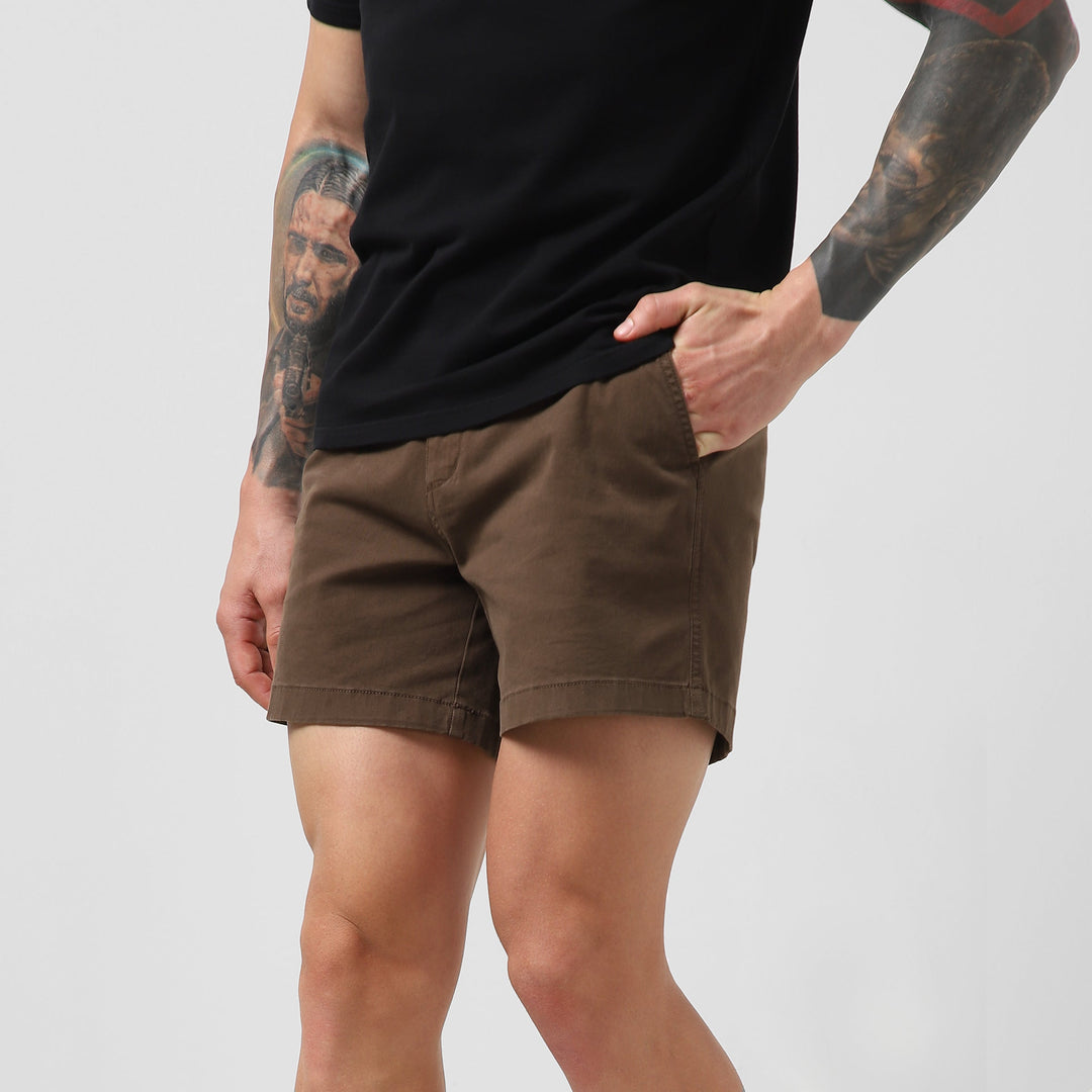 Stretch Short 5.5" Cocoa front on model hand in pocket