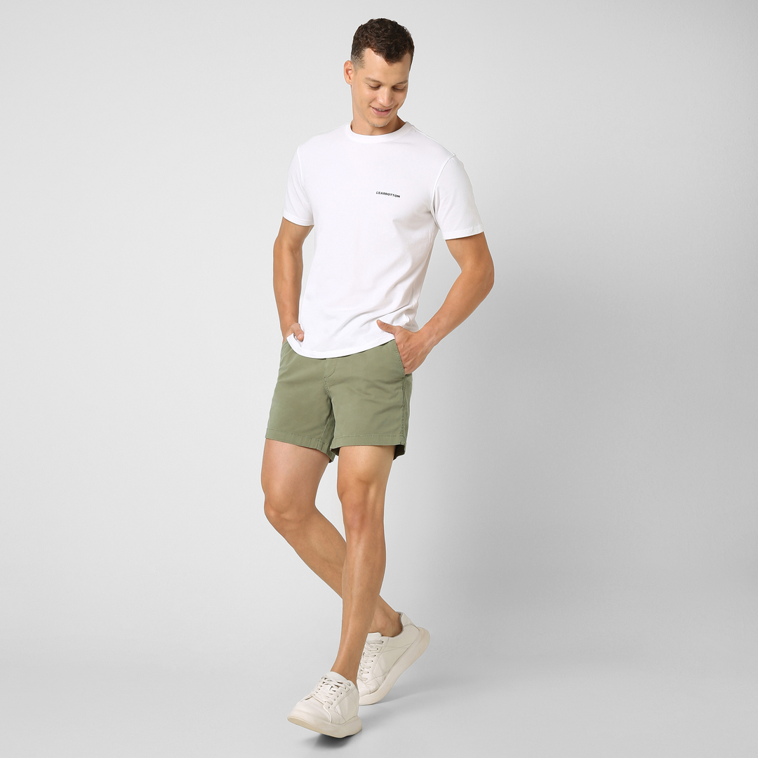 Stretch Short 5.5" Olive front on model worn with Natural Dye Logo Tee White