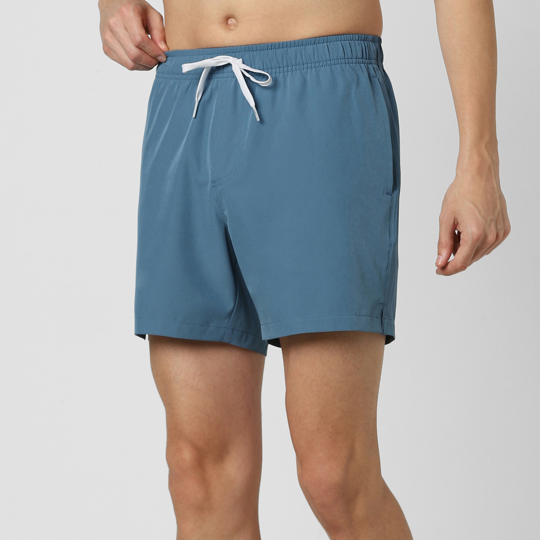 Stretch Swim Solid 5.5" Steel Blue side on model