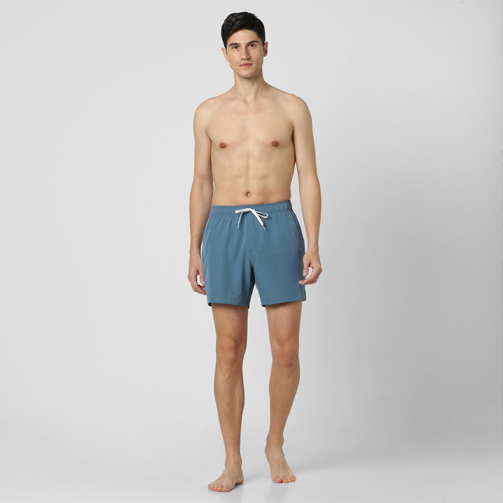 Stretch Swim Solid 5.5" Steel Blue full body on model