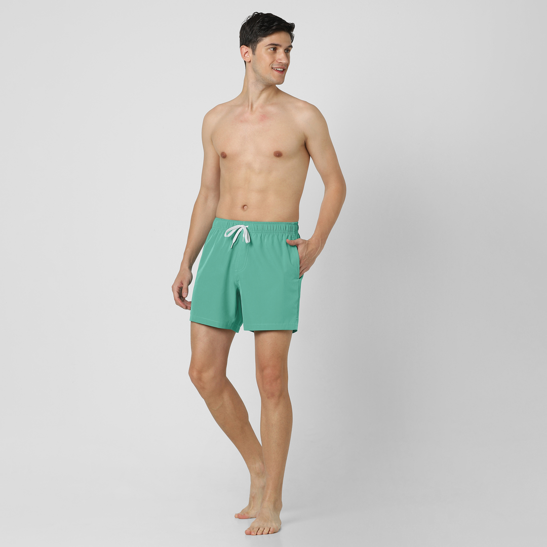 Stretch Swim Solid 5.5" Aqua full body on model