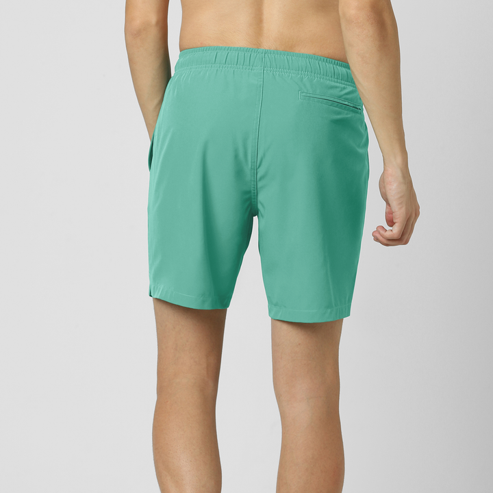 Stretch Swim Solid 7" Aqua back on model