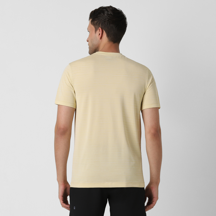 Stride Tee Sand back on model