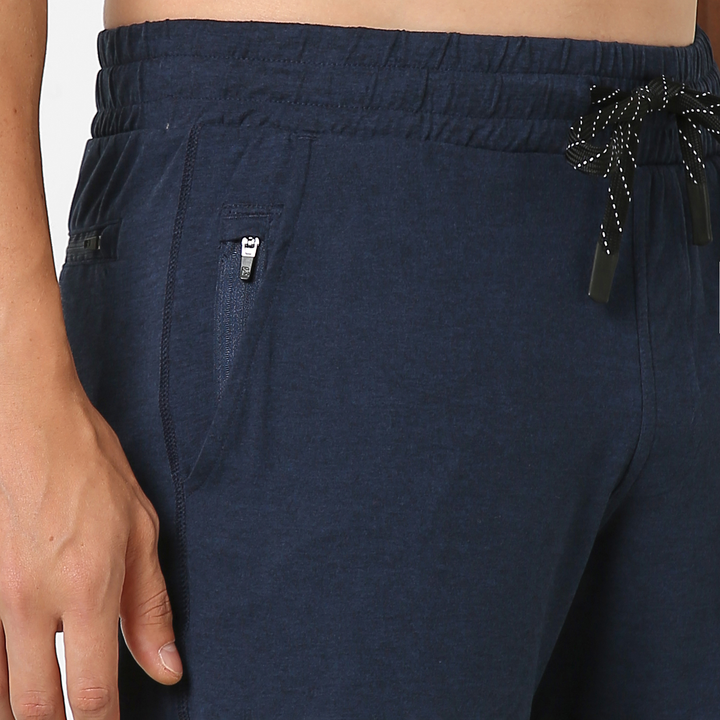 Tech Short 5" Navy close up right zipper pocket on model
