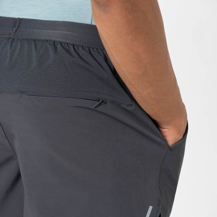 Track Short Lined 4.5" Coal close up back zipper pocket on model