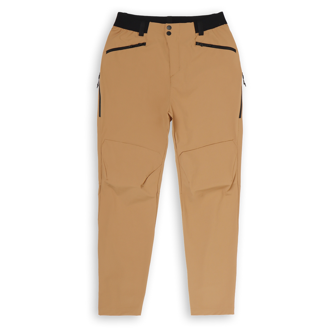 Trail Pant Desert front with zipper front pockets, elastic waistband with belt loop, and perforated side vent pockets.
