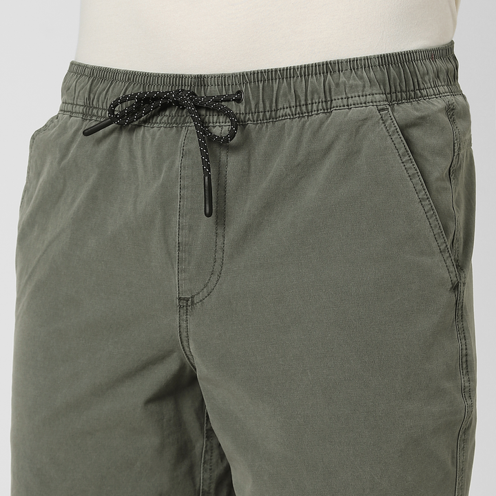 Volley Short 7" Green close up front on model