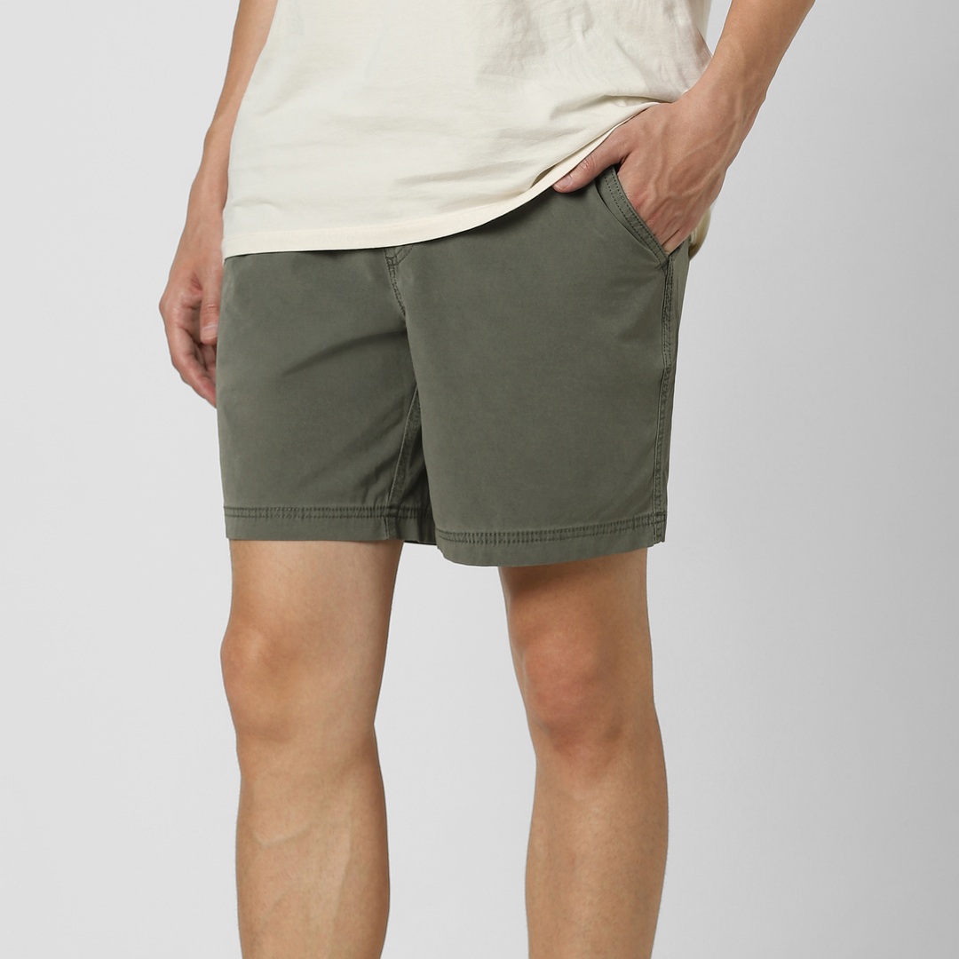 Volley Short 7" Green side on model