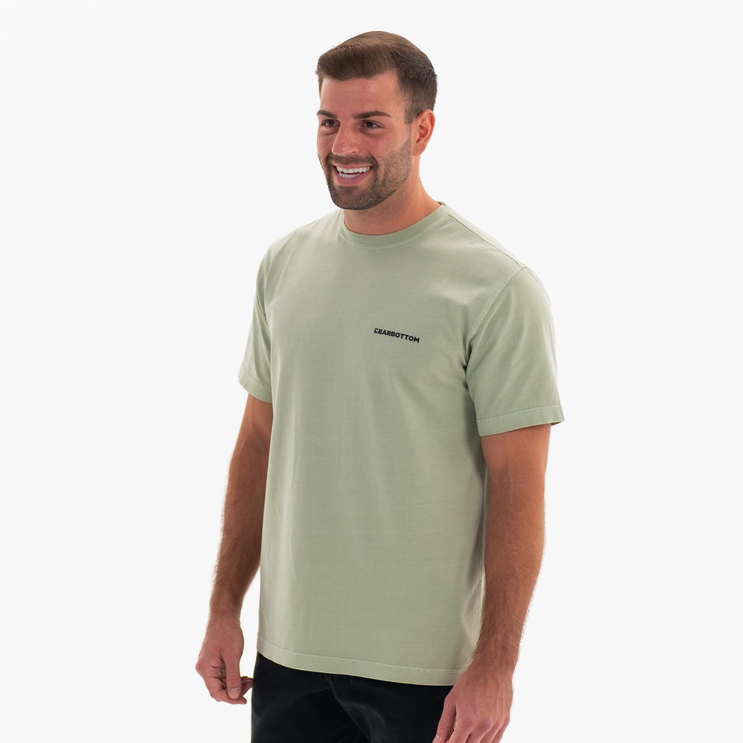 Natural Dye Logo Tee Sage side on model